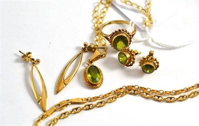 Lot 168 - A peridot ring, pendant and earrings, a 9ct gold chain and a pair of earrings