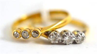 Lot 195 - Two three stone diamond rings