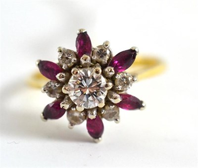 Lot 196 - A ruby and diamond flower ring