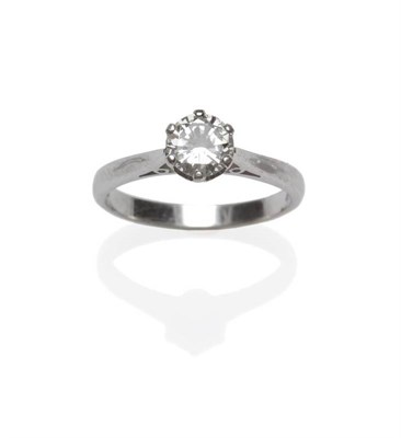 Lot 403 - An 18 Carat White Gold Diamond Solitaire Ring, the round brilliant cut diamond in a six claw...