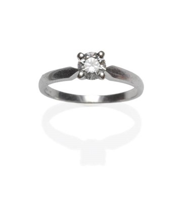 Lot 404 - An 18 Carat White Gold Diamond Solitaire Ring, the round brilliant cut diamond in a white four claw