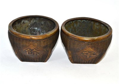 Lot 236 - A pair of modern Chinese bronze food bowls