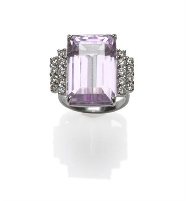 Lot 408 - An 18 Carat White Gold Kunzite and Diamond Ring, the step cut kunzite within two rows of round...