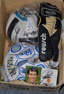 Lot 253 - Signed Newcastle and Leeds footballs and a pair of signed football gloves