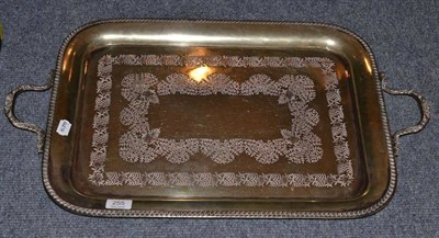 Lot 255 - A silver plated twin handled tray