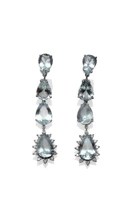 Lot 409 - A Pair of Aquamarine and Diamond Drop Earrings, the four pear cut aquamarines chain linked to...