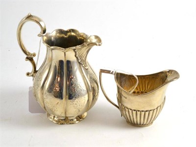 Lot 273 - Victorian silver jug, London, maker's mark EJ & EWB and a silver Goldsmith's & Silversmiths Company