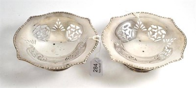 Lot 284 - Pair of white metal pedestal dishes