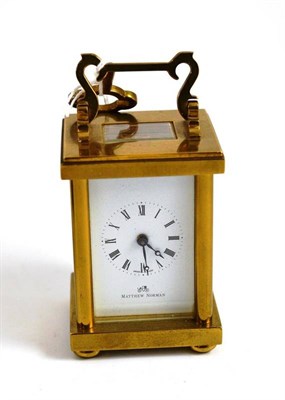 Lot 287 - A miniature carriage timepiece retailed by Matthew Norman