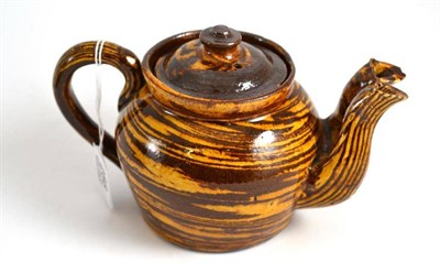 Lot 288 - An unusual double spout slipware teapot