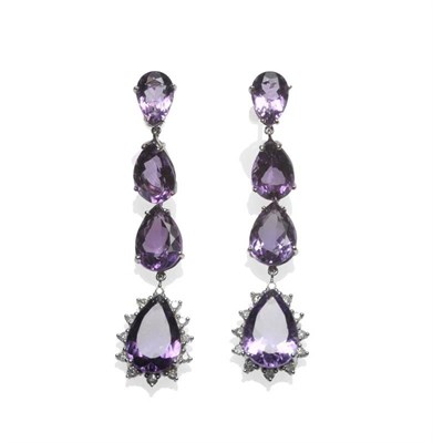 Lot 413 - A Pair of Amethyst and Diamond Drop Earrings, four graduated pear cut amethysts chain linked,...