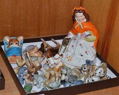 Lot 303 - A Staffordshire figure of Little Red Riding Hood and a quantity of Wade Whimsies - Lady & The Tramp