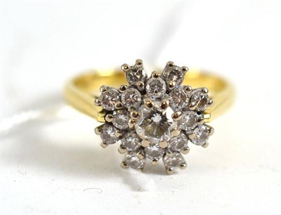 Lot 316 - An 18ct gold diamond cluster ring