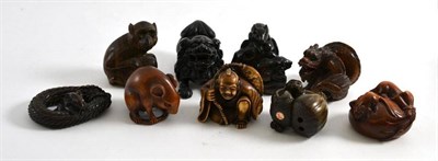 Lot 337 - Nine carved wood netsukes