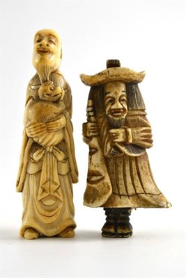 Lot 346 - Two ivory/bone netsukes a Dutchman and another