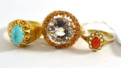 Lot 366 - A solitaire ring, a coral ring and a turquoise ring