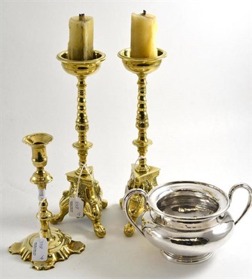 Lot 398 - A pair of ecclesiastical brass candlesticks, another and a silver plated Elkington sugar bowl