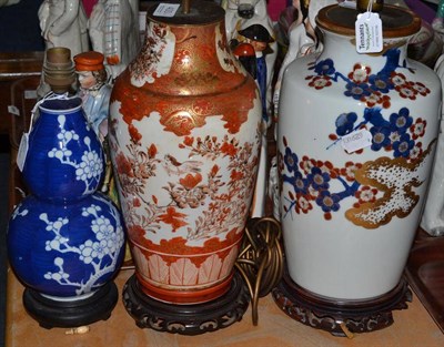 Lot 400 - A Kutani vase and a blue and white gourd vase (both converted to table lamps) and a modern Oriental