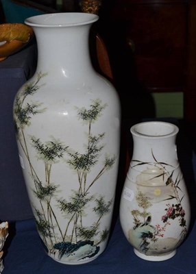 Lot 412 - A large Chinese porcelain vase and a similar smaller vase painted with bamboo