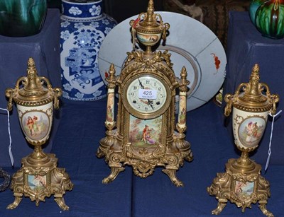 Lot 425 - A modern mantel clock garniture