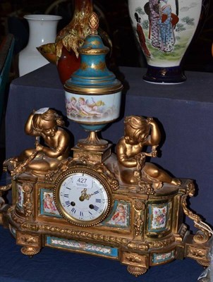 Lot 427 - A French gilt metal Sevres-style clock