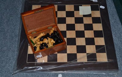 Lot 439 - A Jaques boxwood and ebony chess set and board