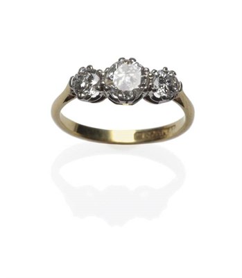 Lot 431 - A Diamond Three Stone Ring, three graduated old brilliant cut diamonds in white claw settings, to a