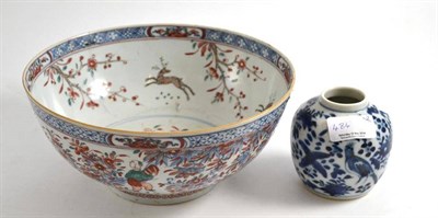 Lot 484 - An 18th century Chinese blue and white bowl, 'clobbered' (a.f.) and a small Chinese blue and...