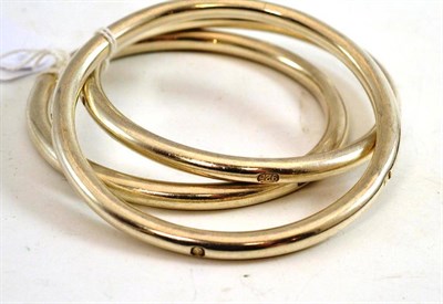 Lot 494 - Three silver bangles