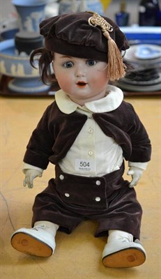 Lot 504 - German bisque socket head doll with blue eyes, bent limb body, modern brown velvet suit