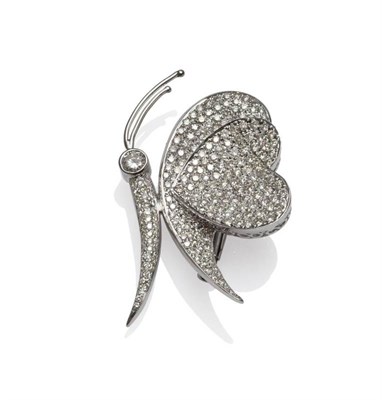 Lot 434 - A Butterfly Brooch, pavé set with round brilliant cut diamonds in a polished white border,...