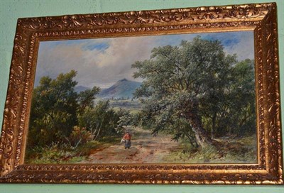 Lot 567 - James Charles Ward R.B.A. RBSA (fl.1830-1875) Lady on a wooded path carrying a basket, signed...