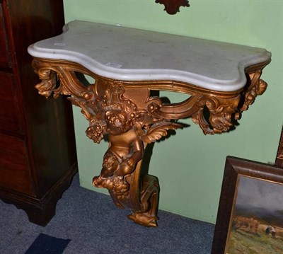 Lot 601 - Gilt and marble top console table