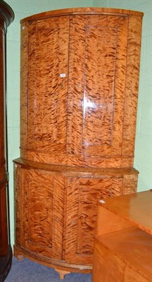 Lot 608 - A burr maple veneered corner cupboard