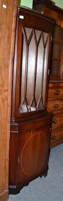 Lot 612 - A reproduction mahogany corner cabinet