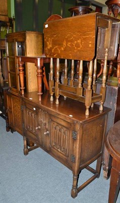 Lot 627 - An oak Sutherland table, a Victorian mahogany hall chair, a reproduction oak linen fold chest and a