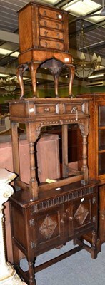 Lot 628 - Reproduction oak side table, a similar cupboard and a reproduction miniature chest on stand