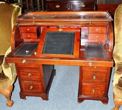 Lot 638 - A Victorian mahogany tambour fronted pedestal desk