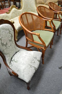 Lot 659 - Three modern cane back conservatory chairs and a reproduction mahogany nursing chair