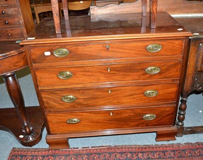 Lot 677 - Georgian mahogany four height chest of drawers