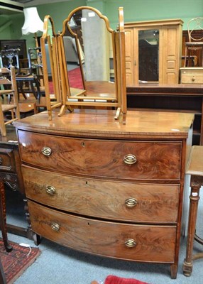 Lot 681 - Bow front mahogany three height chest and a tryptic mirror