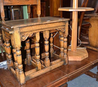 Lot 701 - Nest of tables and an oak standard lamp