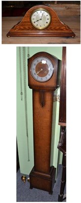 Lot 707 - An Edwardian mahogany mantel timepiece and an oak grandmother clock (2)