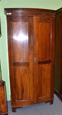 Lot 709 - Edwardian mahogany bowfront wardrobe