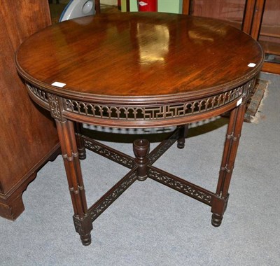 Lot 718 - Mahogany occasional table with cluster columns and pierced stretcher