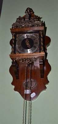 Lot 722 - A Continental wall clock with brass weights