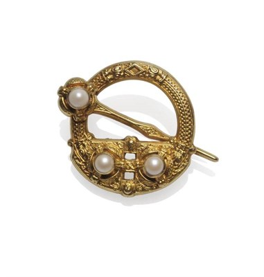 Lot 452 - An 18 Carat Gold Tara Brooch, Dublin, 1904, set with split pearls, measures 3.6cm by 2.8cm