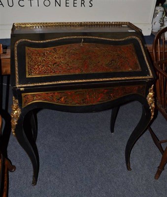 Lot 734 - A boulle style desk with cabriole legs and figural gilt mounts