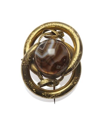 Lot 456 - A Sardonyx Knot Brooch, a cabochon sardonyx centres the yellow knot frame, engraved with floral...