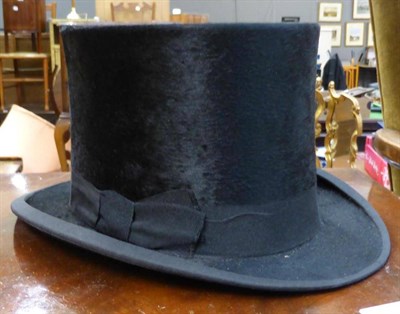 Lot 795 - A black silk top hat by Thomas Gillett, Hull, in cardboard box